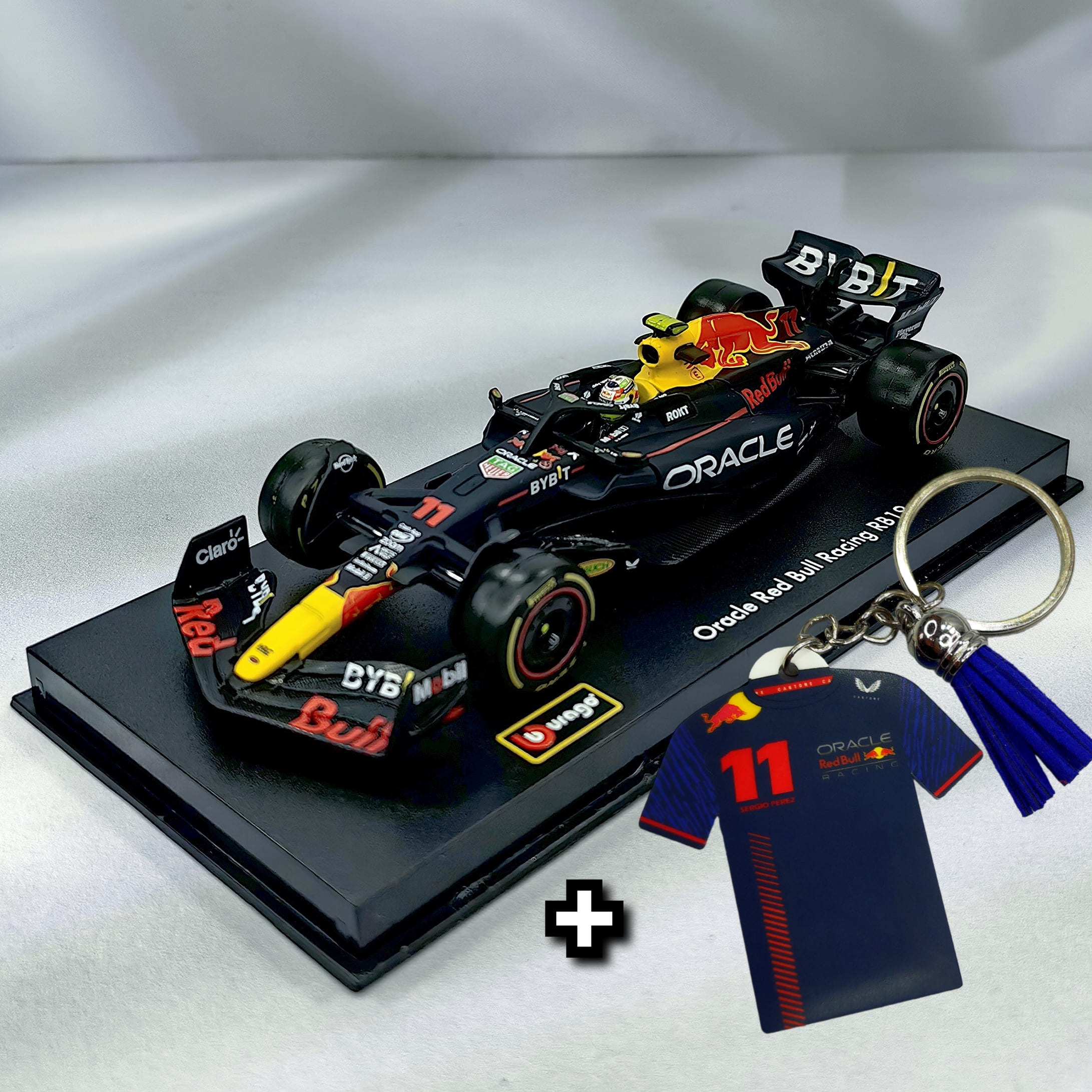 RedBull RB19 2023 #11 Checo Perez Caja Acrilica Burago 1:43 + Llavero Polera