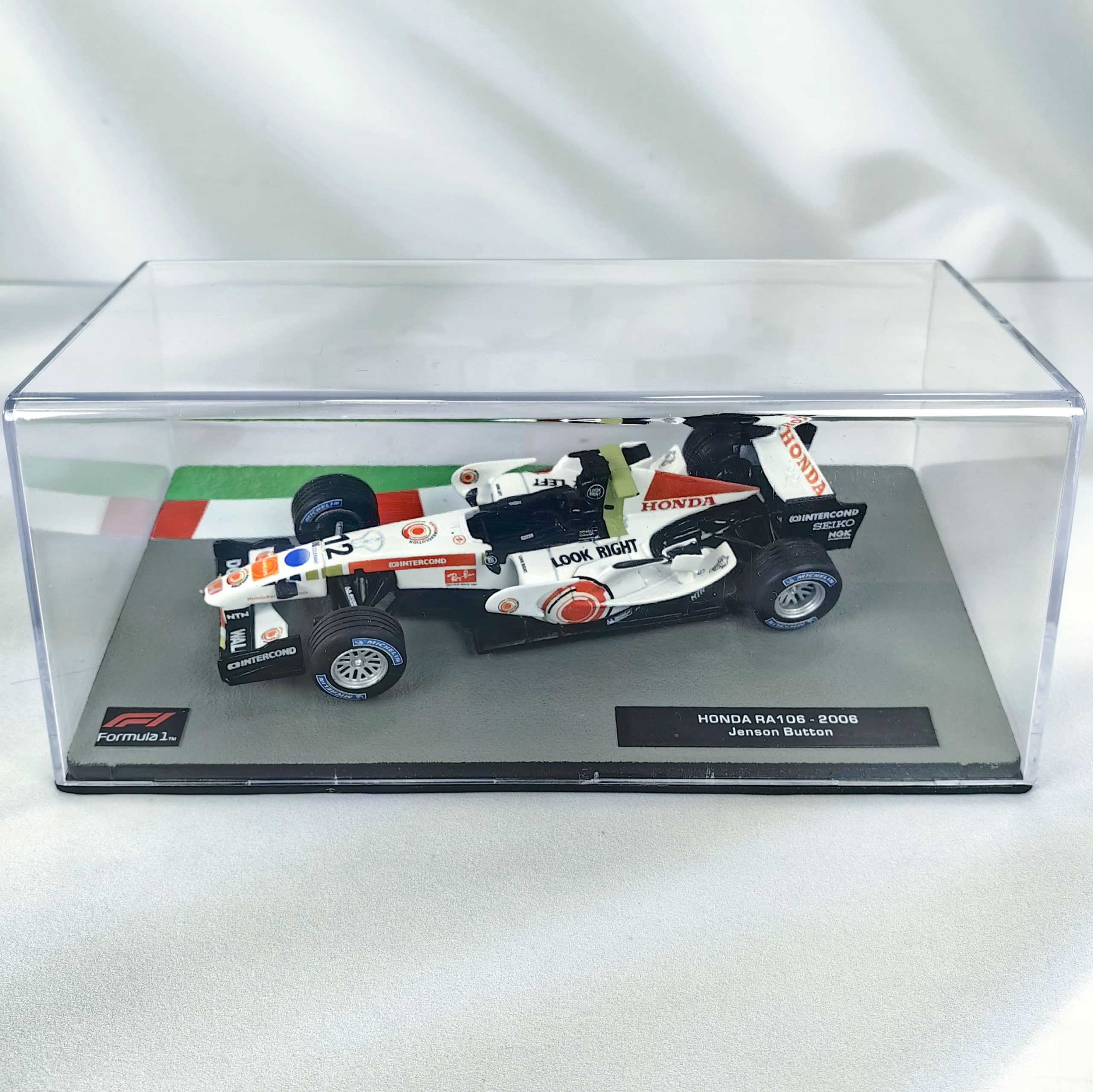 Honda RA106 2006 #12 Jenson Button Caja Acrilica Altaya 1:43