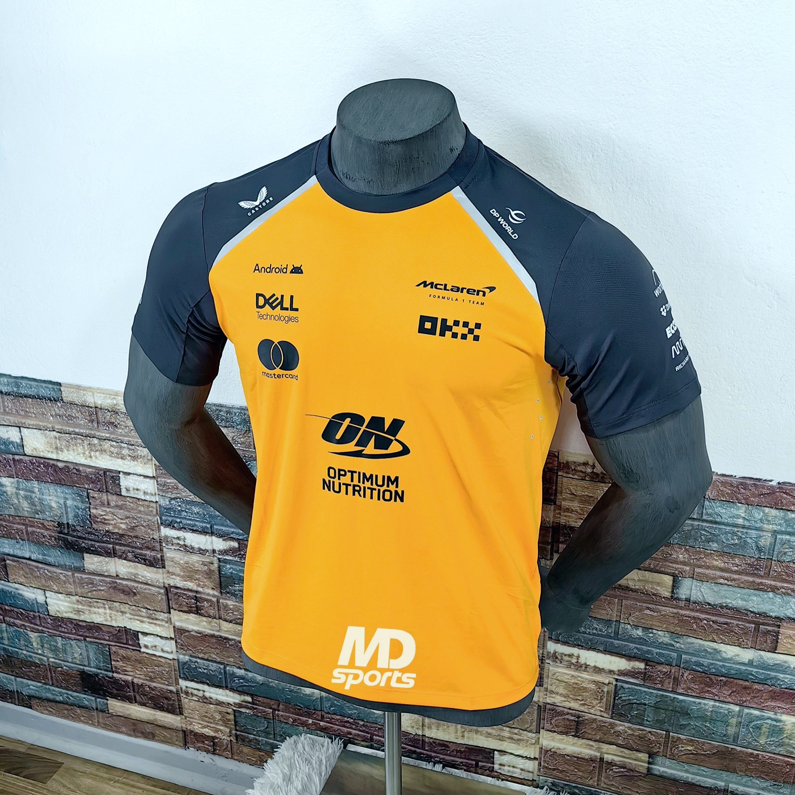 Polera CASTORE Mclaren F1 Team Oficial Teamwear 2025