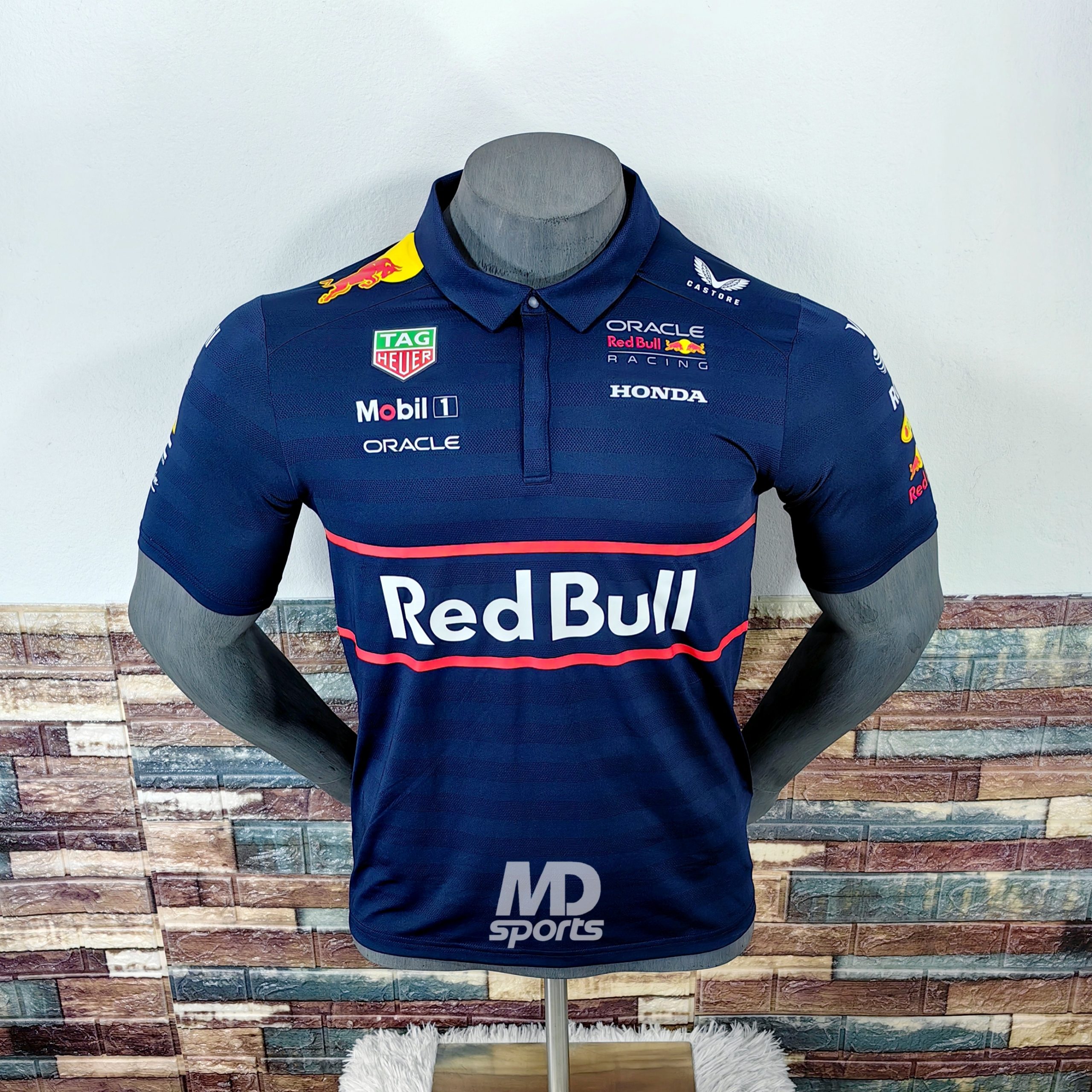 Polera Polo CASTORE Oficial Oracle RedBull Racing Team 2025 Azul