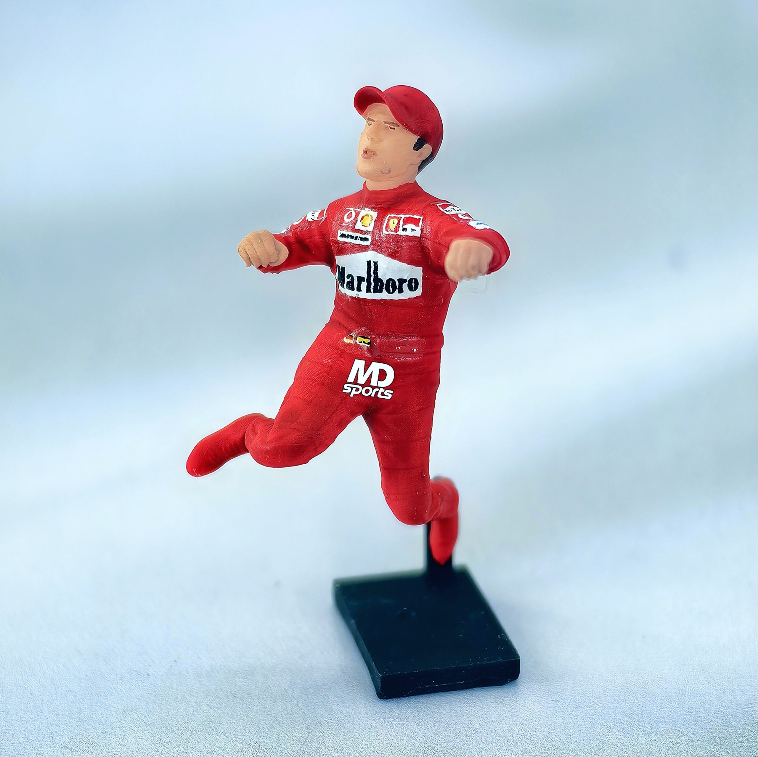 Figura Piloto Michael Schumacher Salto Ferrari Cartrix 1:43