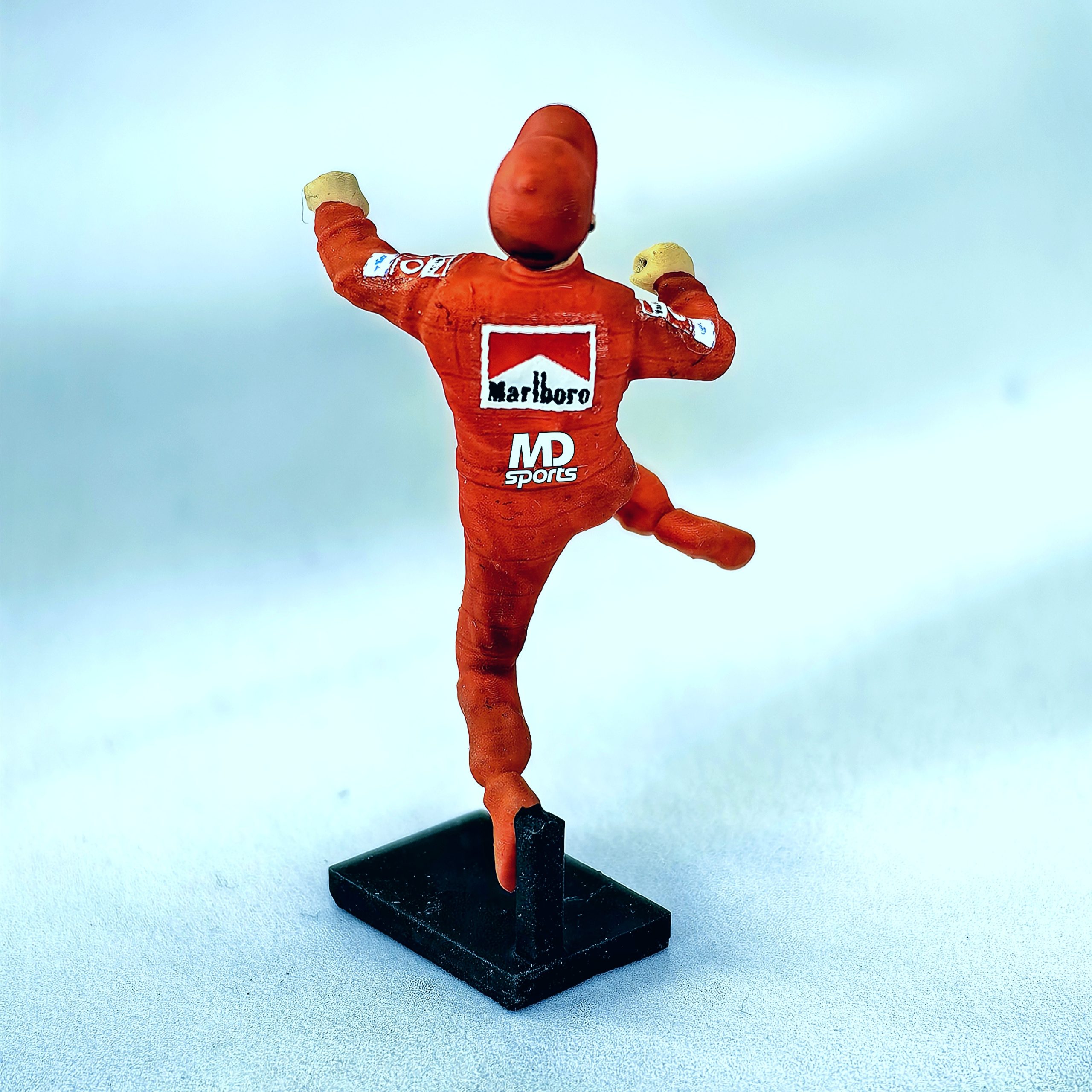 Figura Piloto Michael Schumacher Salto Ferrari Cartrix 1:43