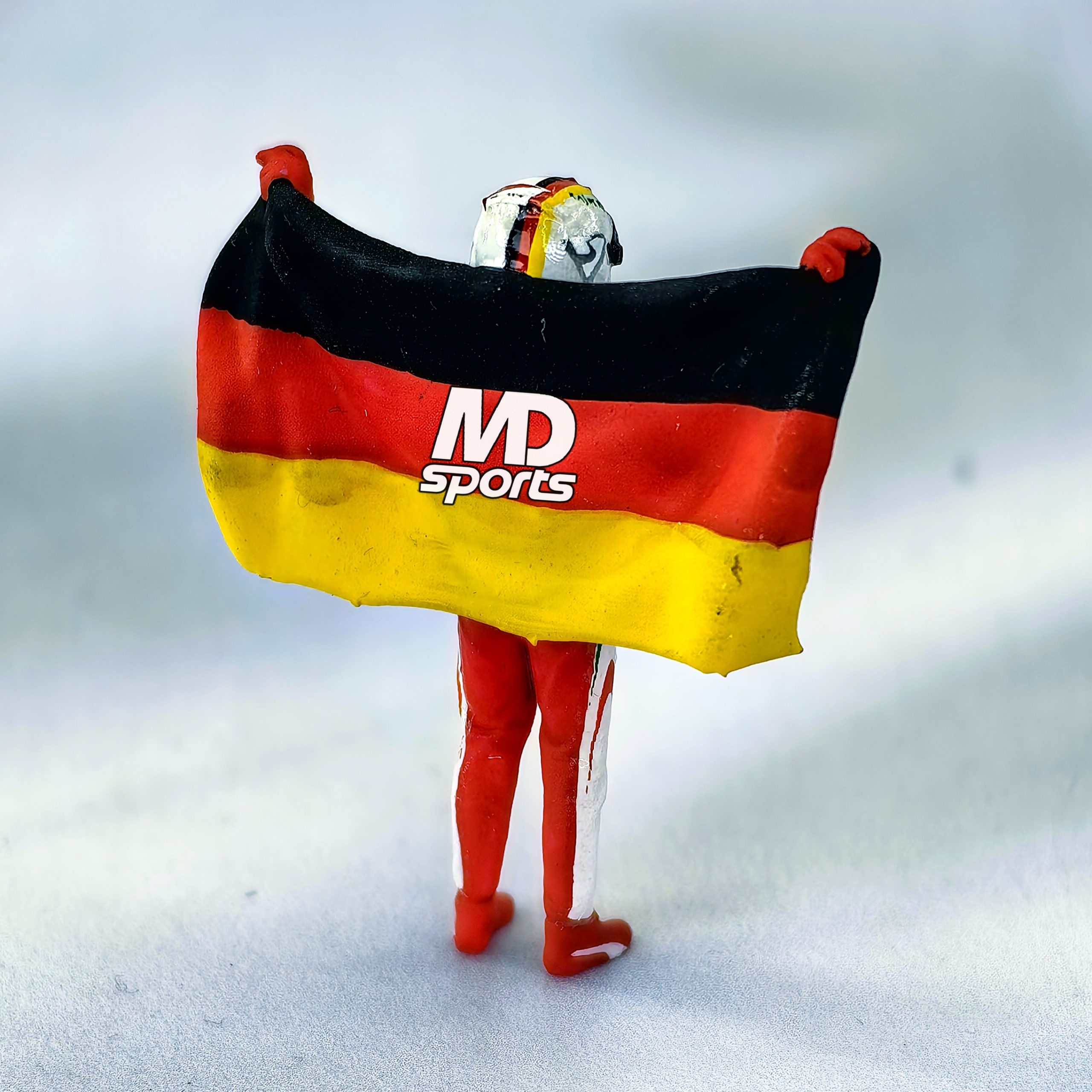 Figura Piloto Sebastian Vettel Ferrari con Bandera Cartrix 1:43