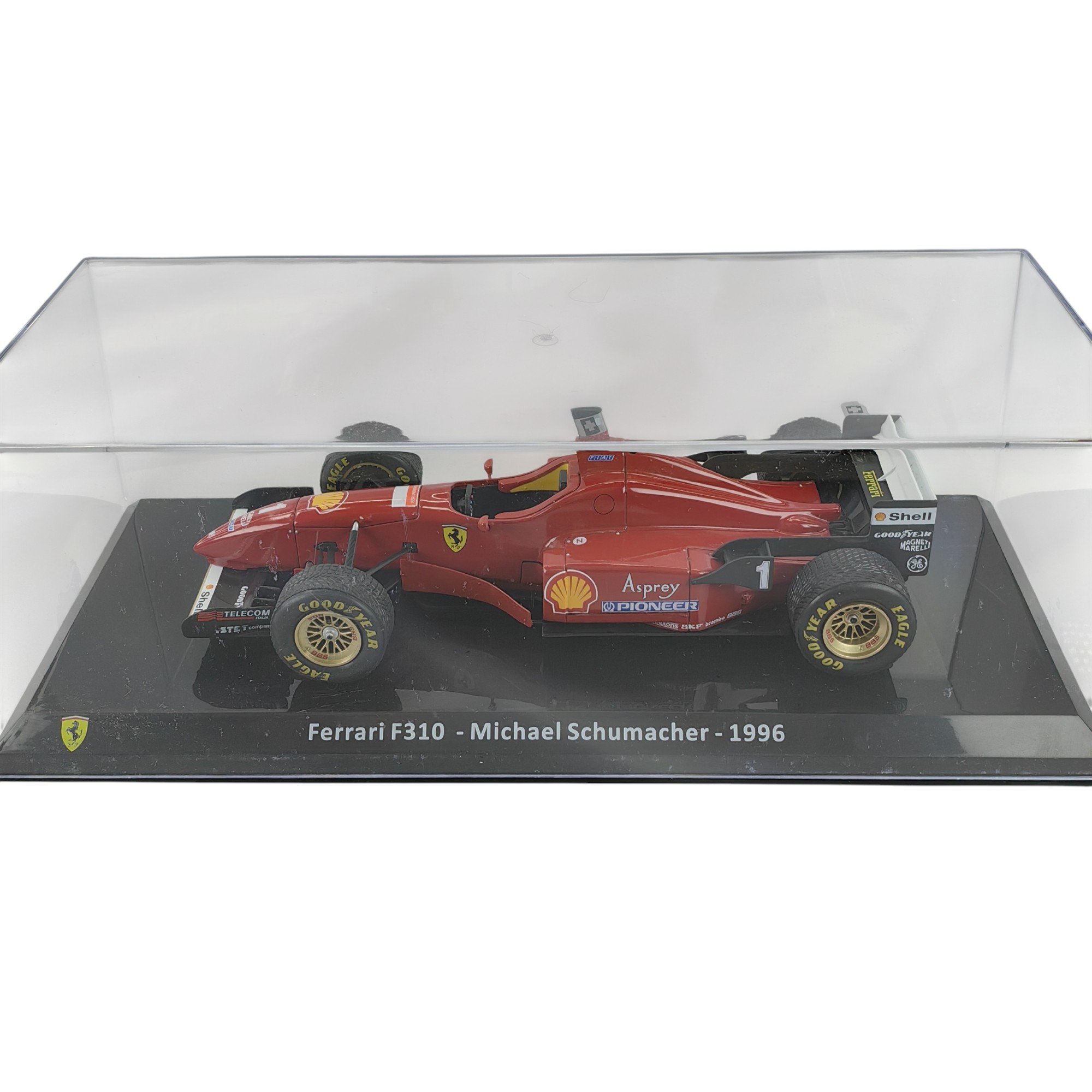 Ferrari F310 1996 #1 Michael Schumacher Caja Acrilica Premium Collect 1:24