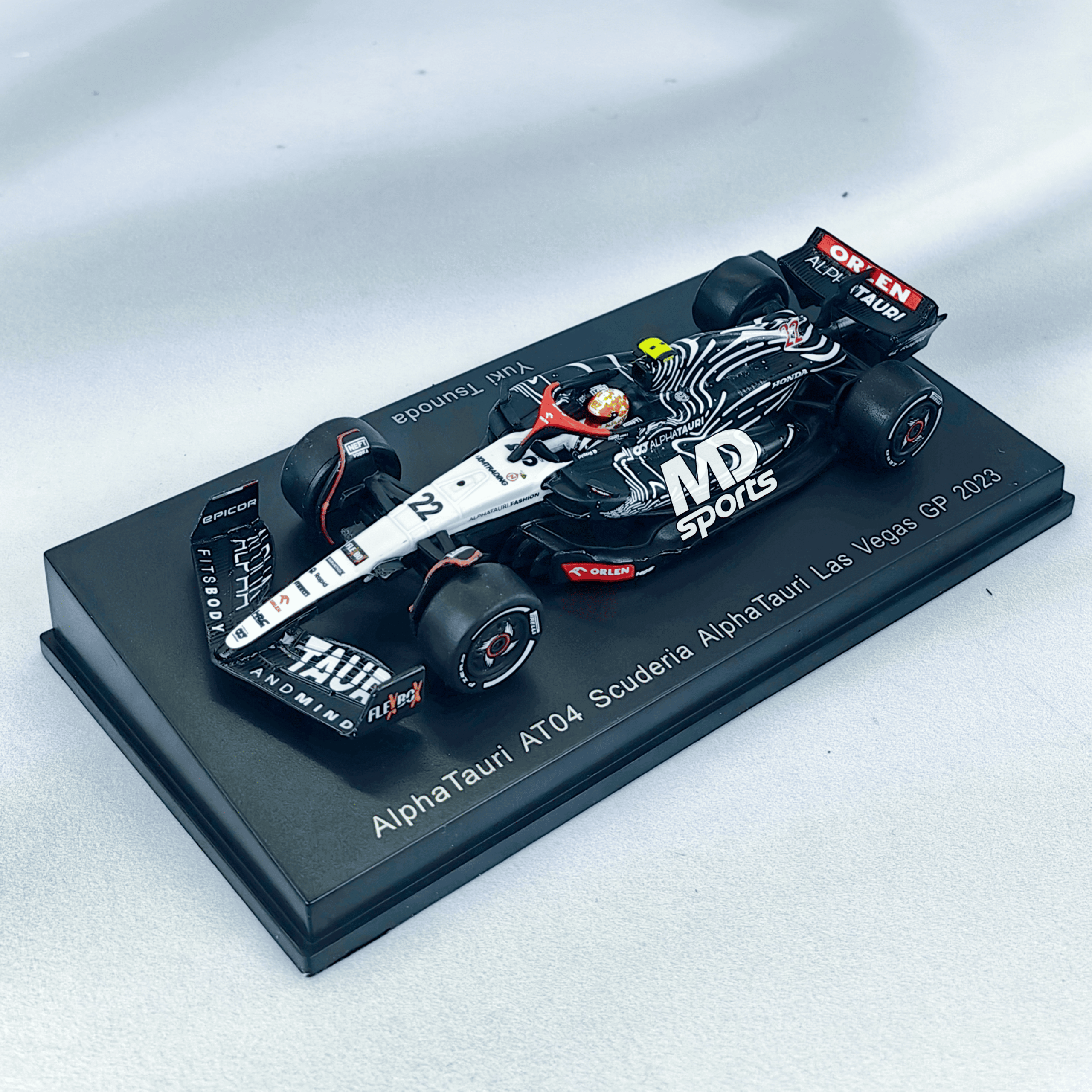 Alpha Tauri AT04 GP Las Vegas 2023 #22 Yuki Tsunoda Caja Acrilica Spark 1:64 - Imagen 3