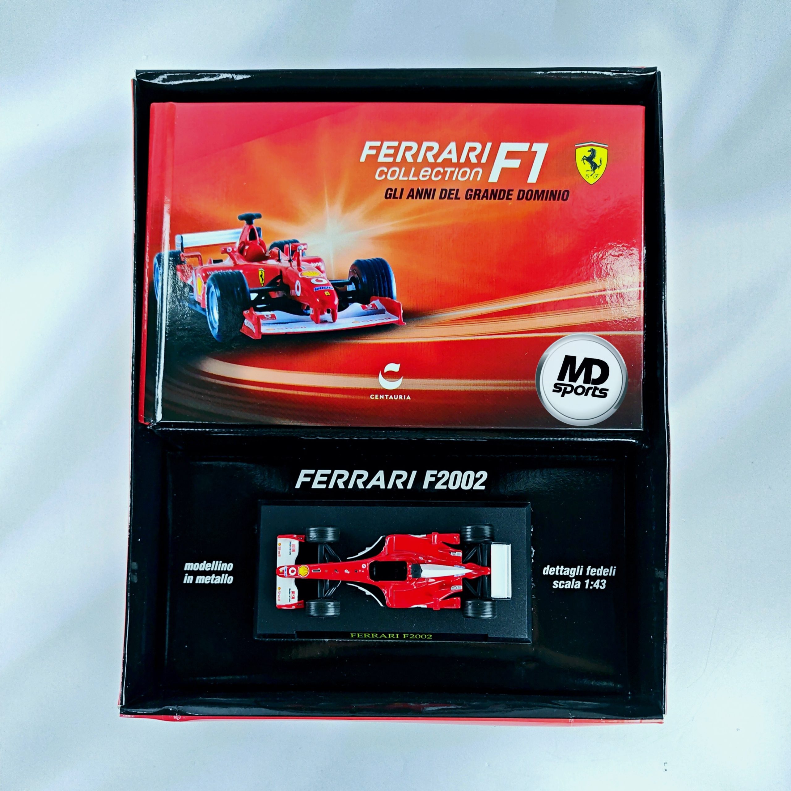 Ferrari F2002 #1 Michael Schumacher Caja Normal + Libro Ilustrado Centauria 1:43