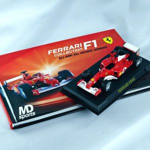 Ferrari F2002 #1 Michael Schumacher Caja Normal + Libro Ilustrado Centauria 1:43 (Auto con detalle)