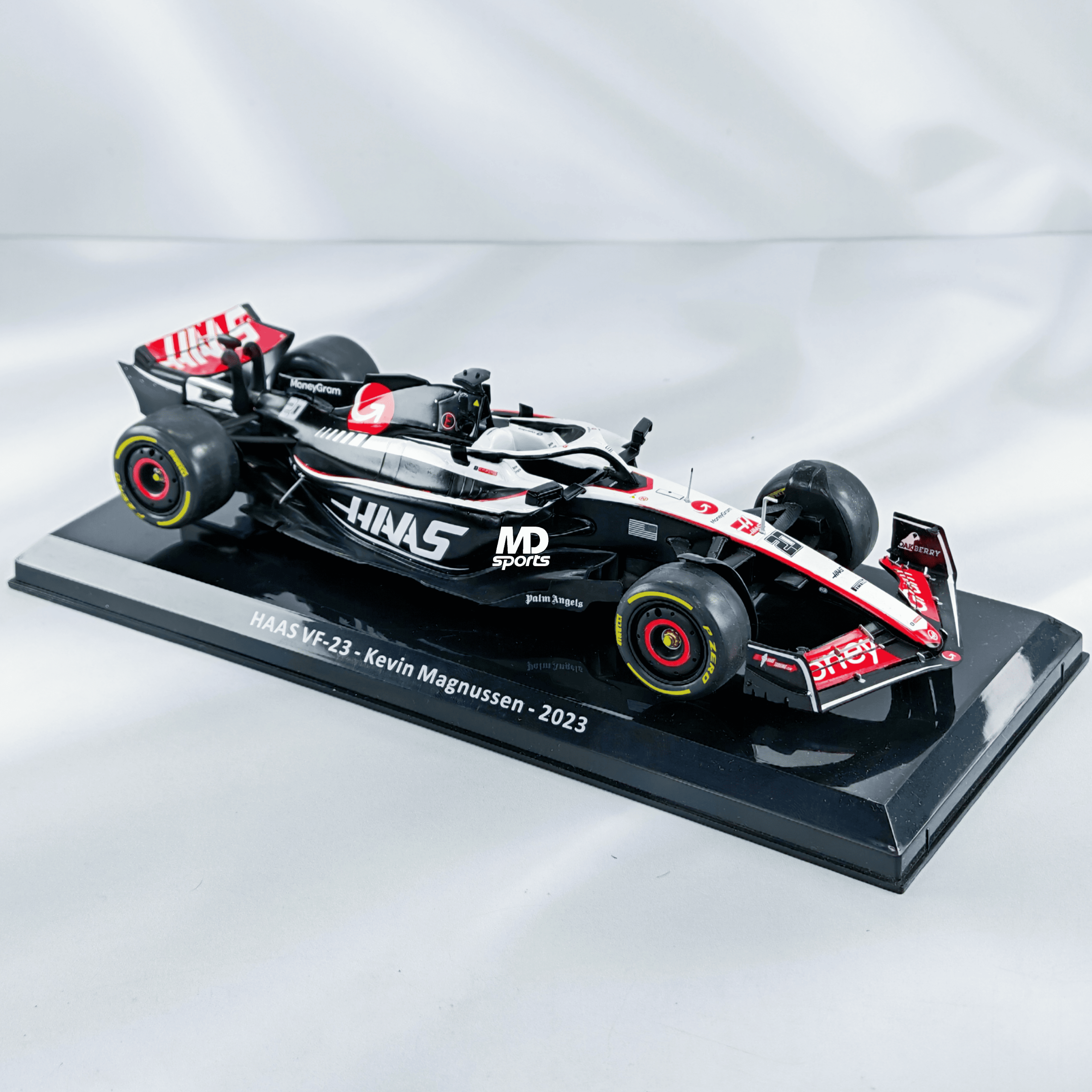Haas VF-23 2023 #20 Kevin Magnussen Caja Normal Premium Collect 1:24