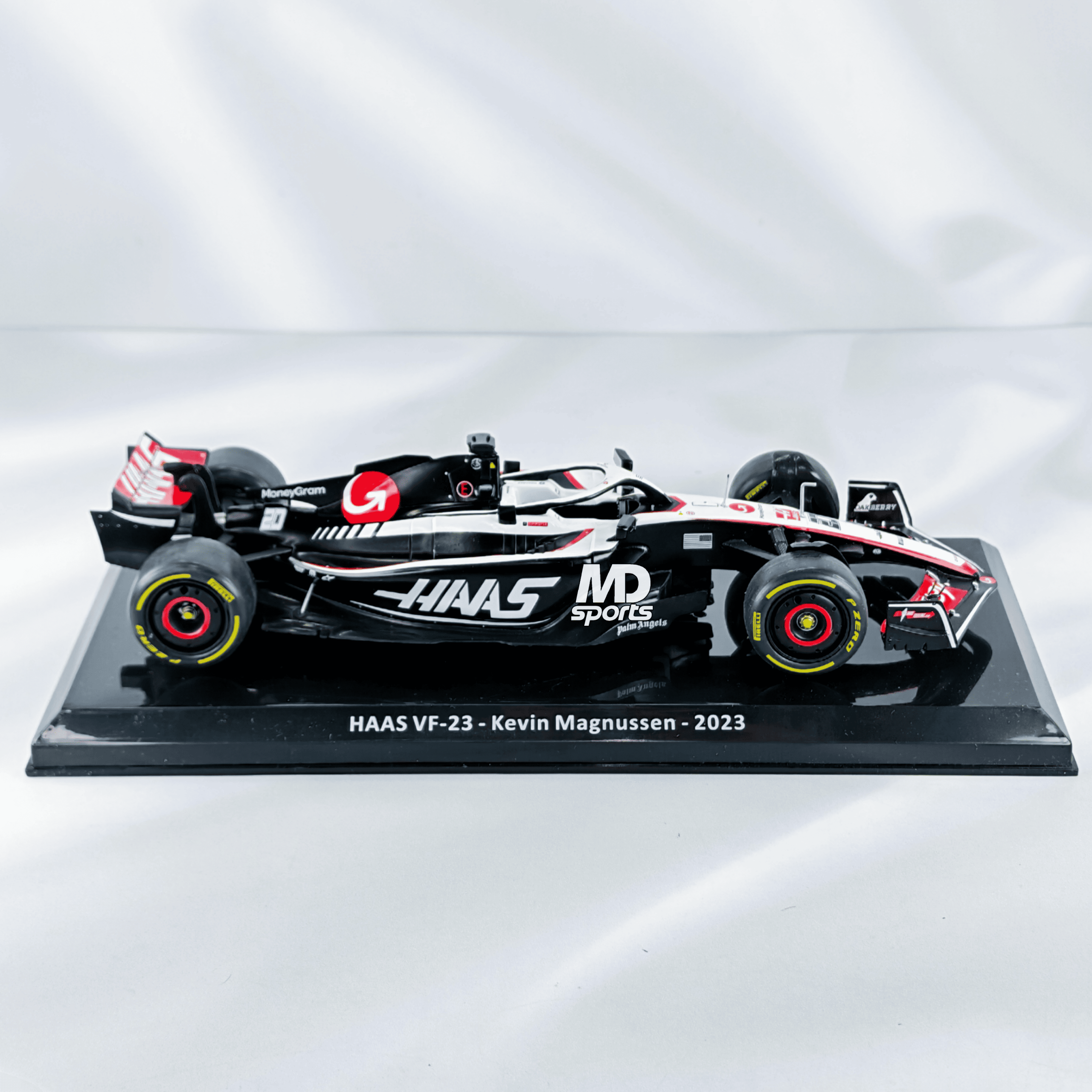 Haas VF-23 2023 #20 Kevin Magnussen Caja Normal Premium Collect 1:24
