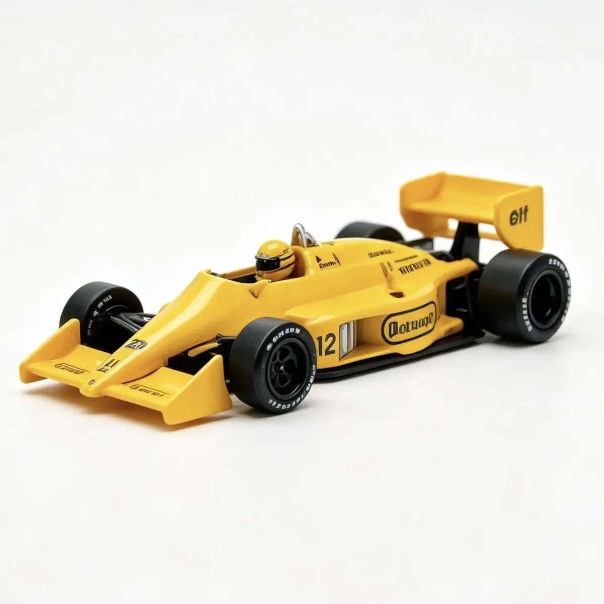 Lotus 99T GP Monaco 1987 #12 Ayrton Senna MiniGT 1:64 (Incluye Decals Camel)